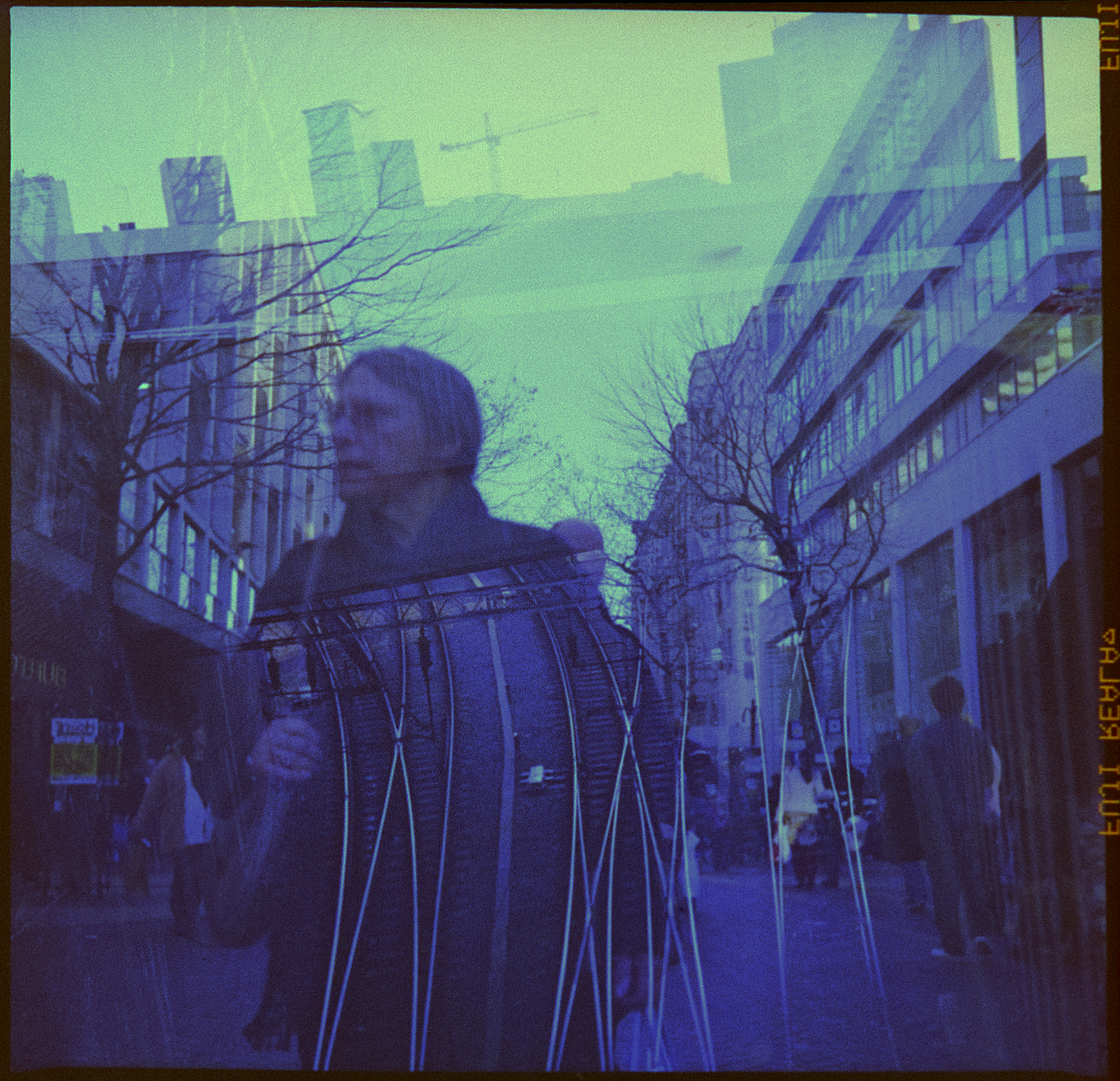 double-exposure-shoppers-new-street-birmingham-fuji-reala.jpg